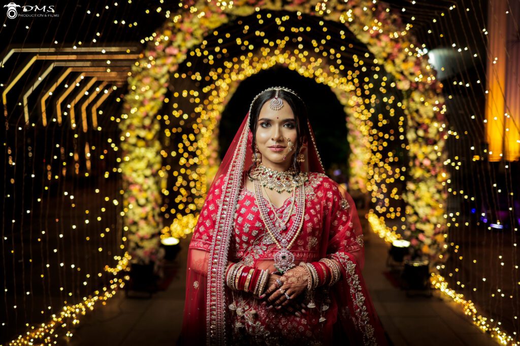 Wedding photography of bride in a background fills with lights