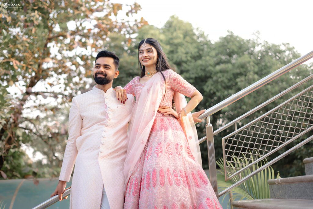 Engagement couple standing together on stairs