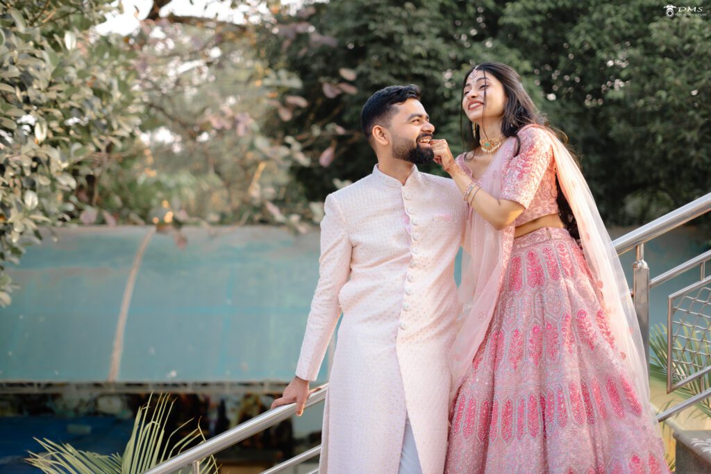 engagement bride and groom laughing together on stairs