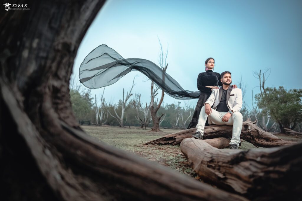 Destination Pre wedding photograph of couple where bride dress is waving in air