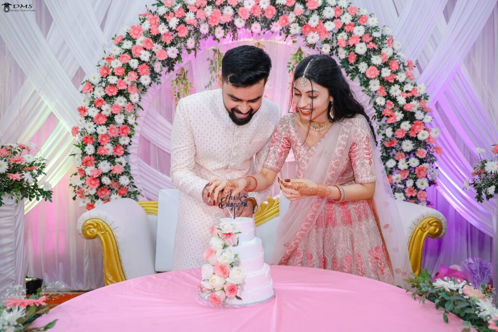 Ring ceremony of Bhubaneswar couple cutting cake together