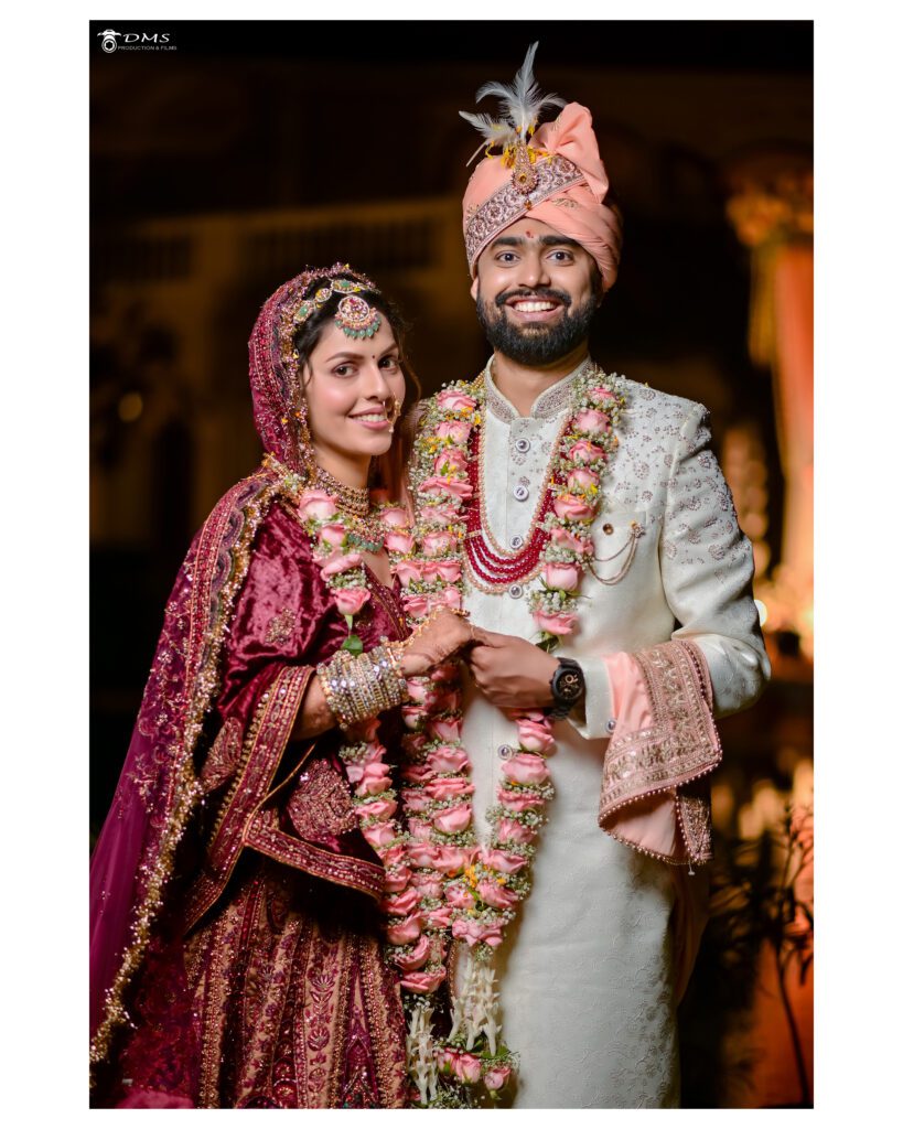 A beautiful wedding couple Photography in Indian wedding Dress with a joy on their faces